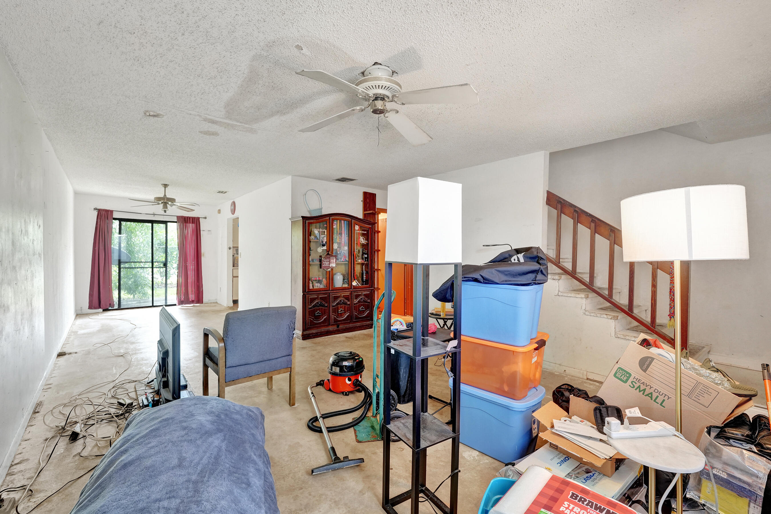 6505 Dockside Circle Greenacres, FL 33463 - Photo 18 of 38 a living room with furniture kitchen view and a window