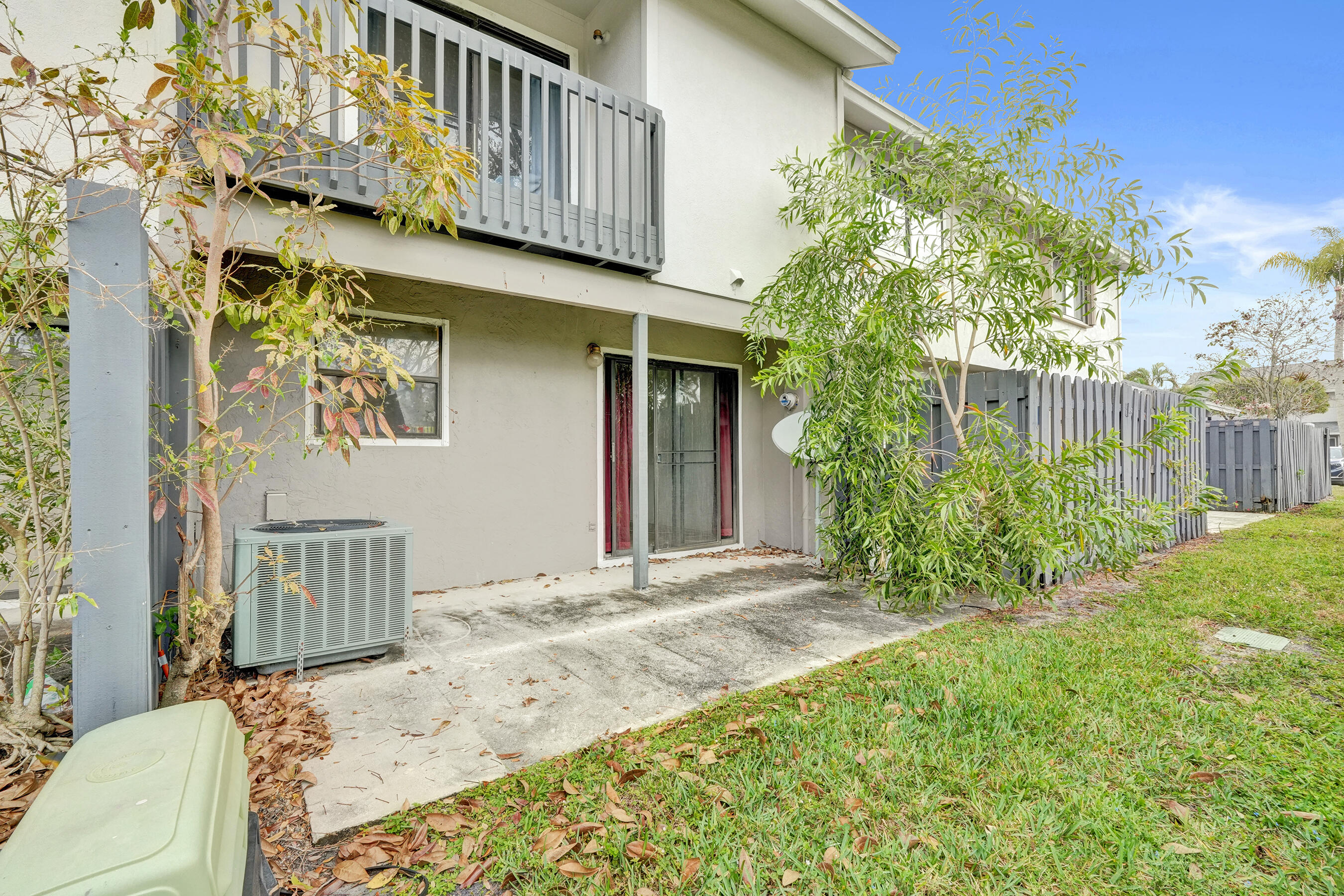 6505 Dockside Circle Greenacres, FL 33463 - Photo 2 of 38 a view of a house with a yard