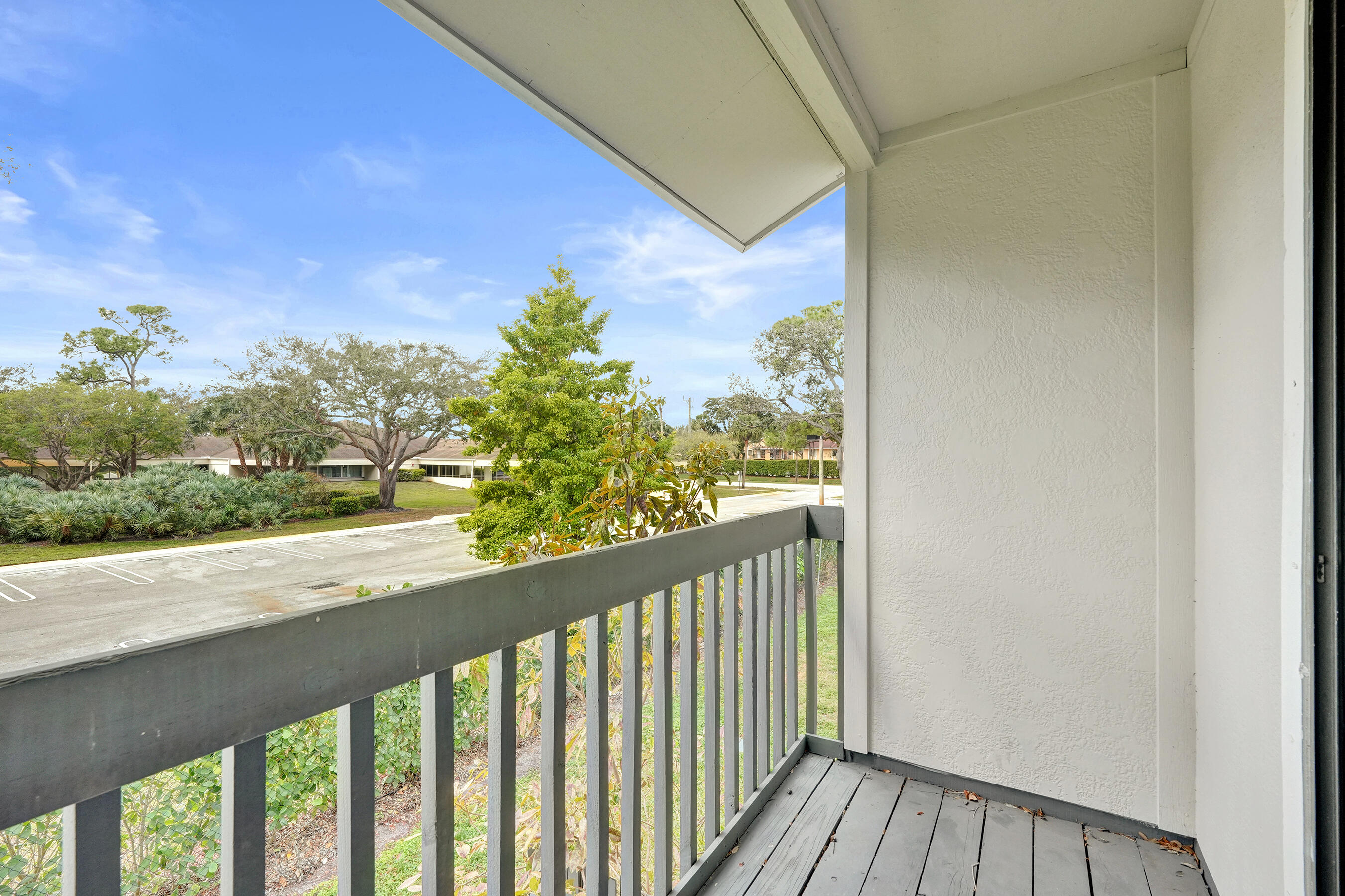 6505 Dockside Circle Greenacres, FL 33463 - Photo 4 of 38 a view of a balcony with wooden floor