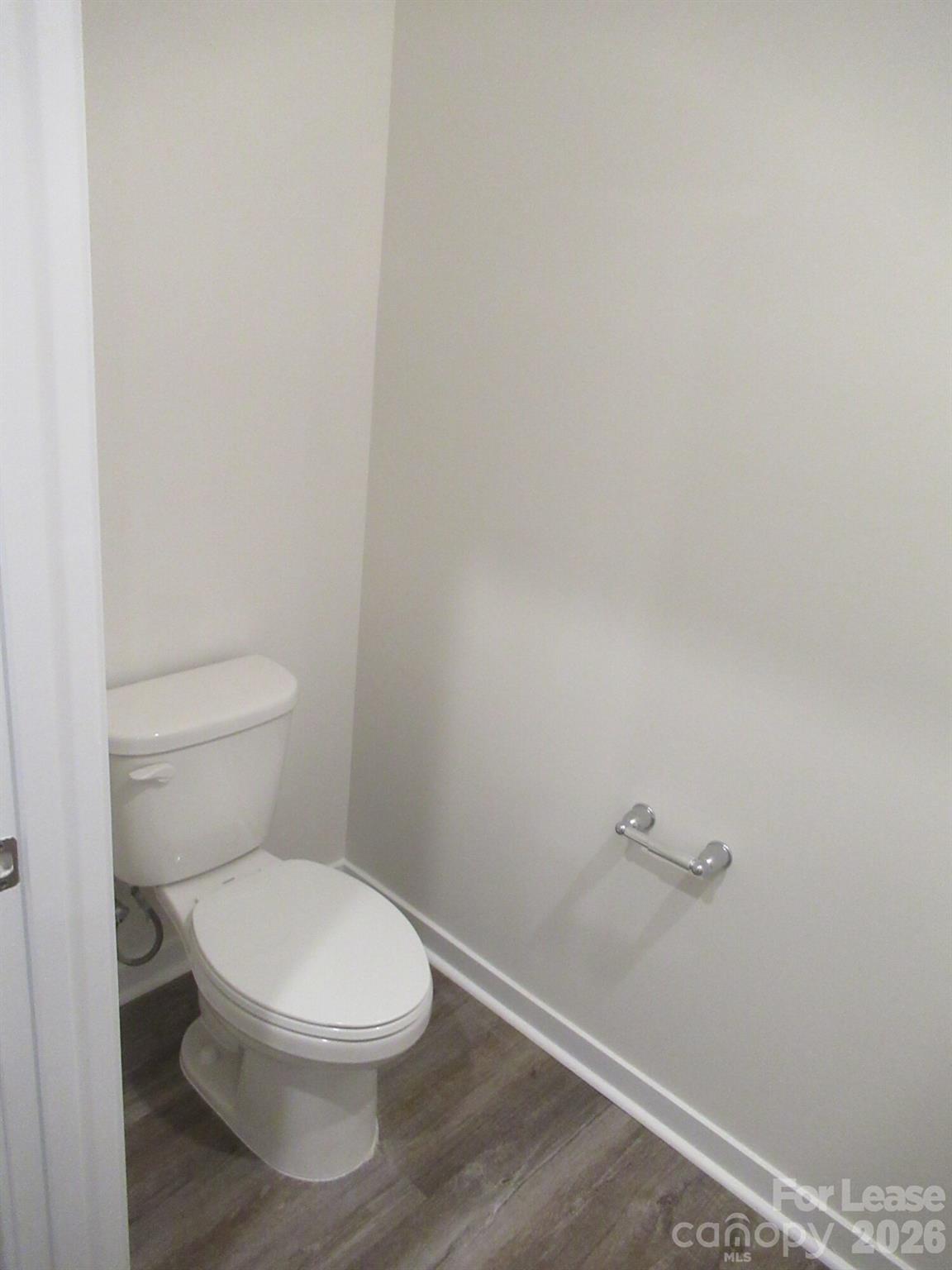 3192 Ora Smith Road Lincolnton, NC 28092 - Photo 12 of 34 a white toilet sitting next to a white sink