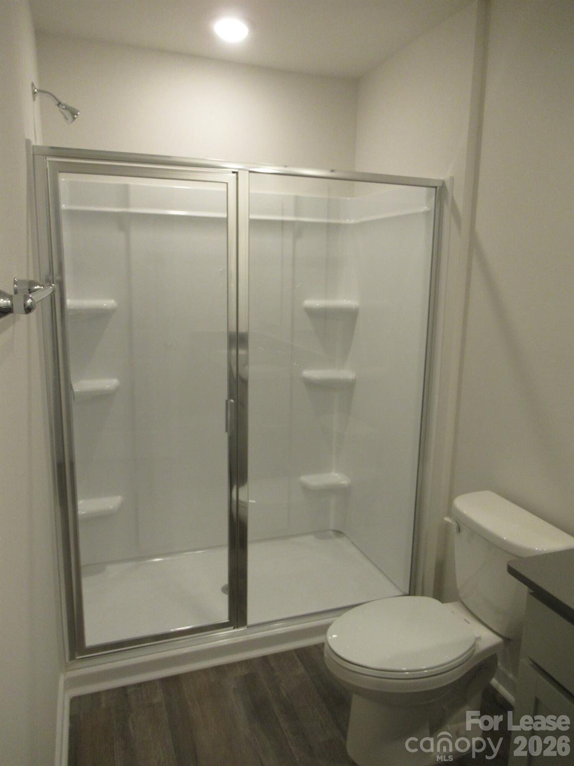 3192 Ora Smith Road Lincolnton, NC 28092 - Photo 16 of 34 a bathroom with a toilet and a shower