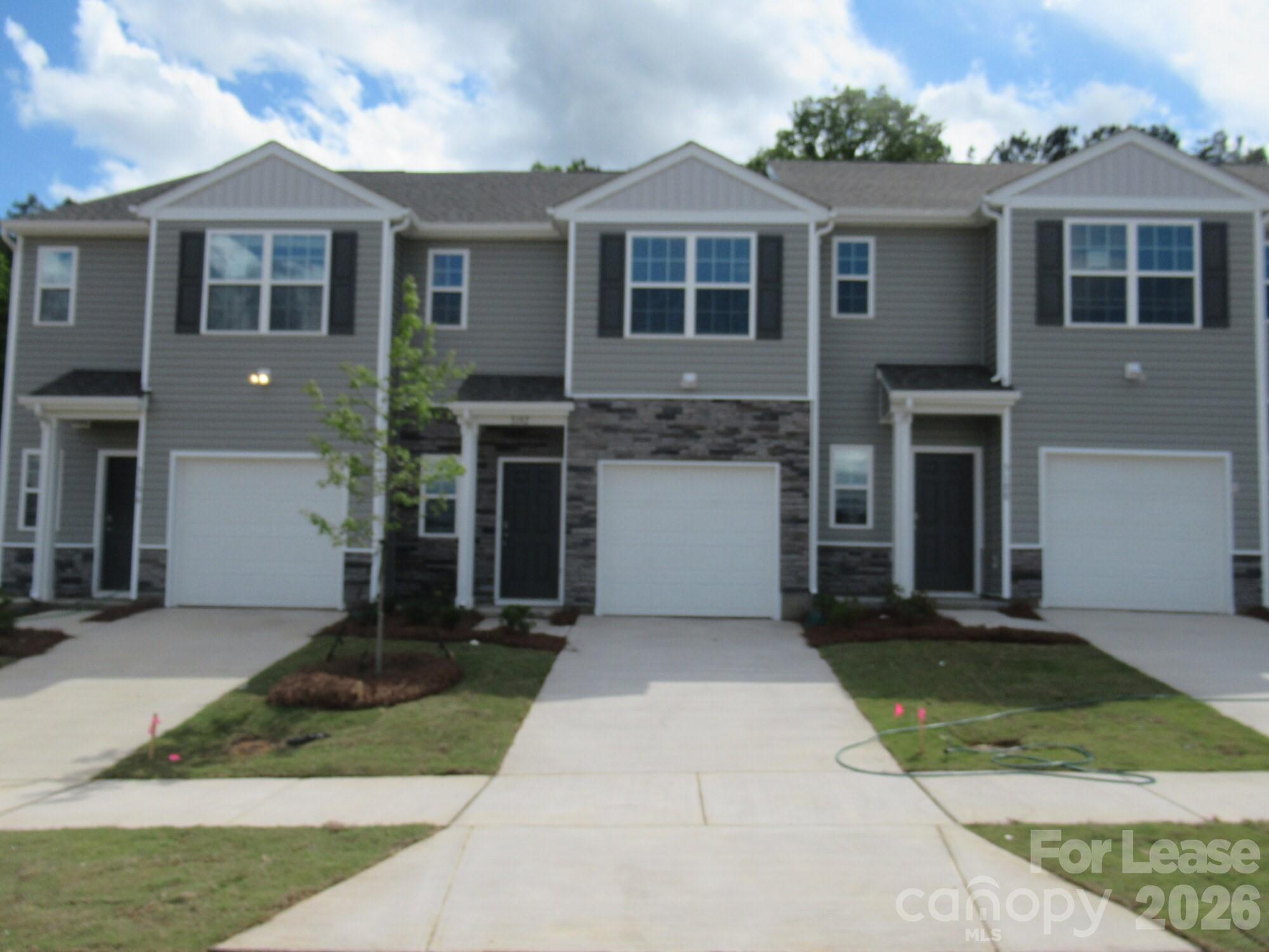 3192 Ora Smith Road Lincolnton, NC 28092 - Photo 2 of 34 a front view of a house with a yard