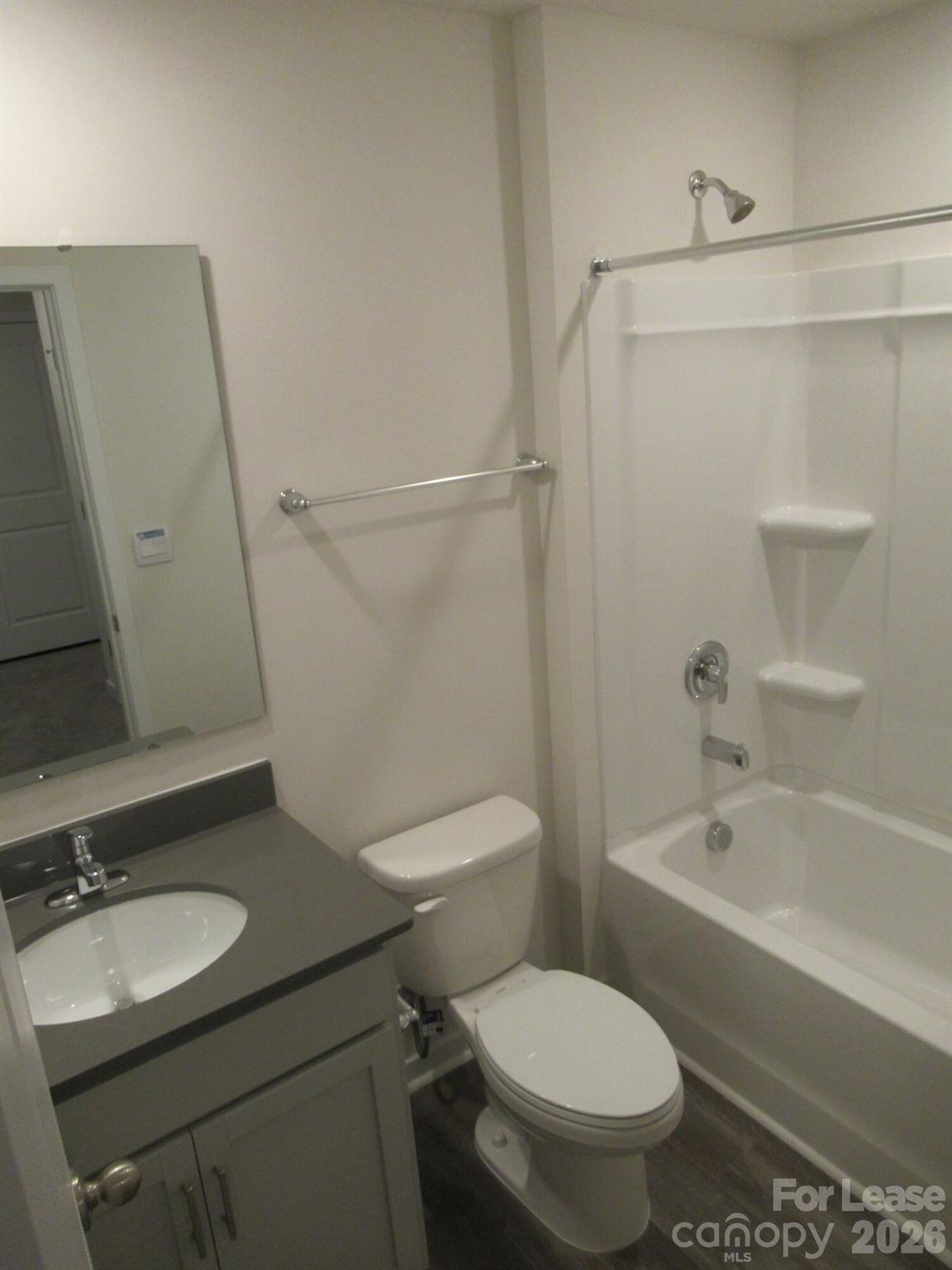 3192 Ora Smith Road Lincolnton, NC 28092 - Photo 24 of 34 a white toilet sitting next to a bath tub