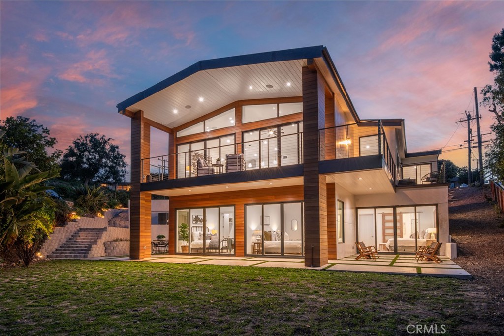 48 Rockinghorse Road Rancho Palos Verdes, CA 90275 - Photo 1 of 1 a front view of a house with a yard