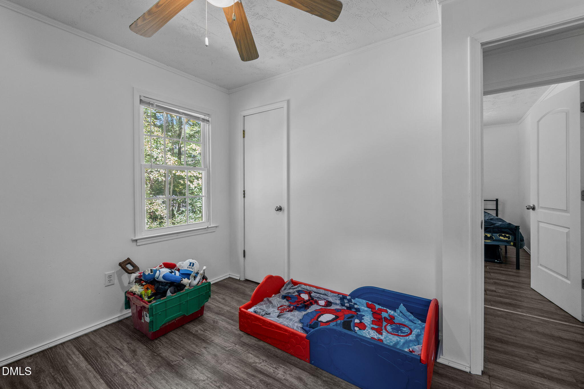 670 Tingen Mine Road Roxboro, NC 27574 - Photo 17 of 30 a room with toys and wooden floor
