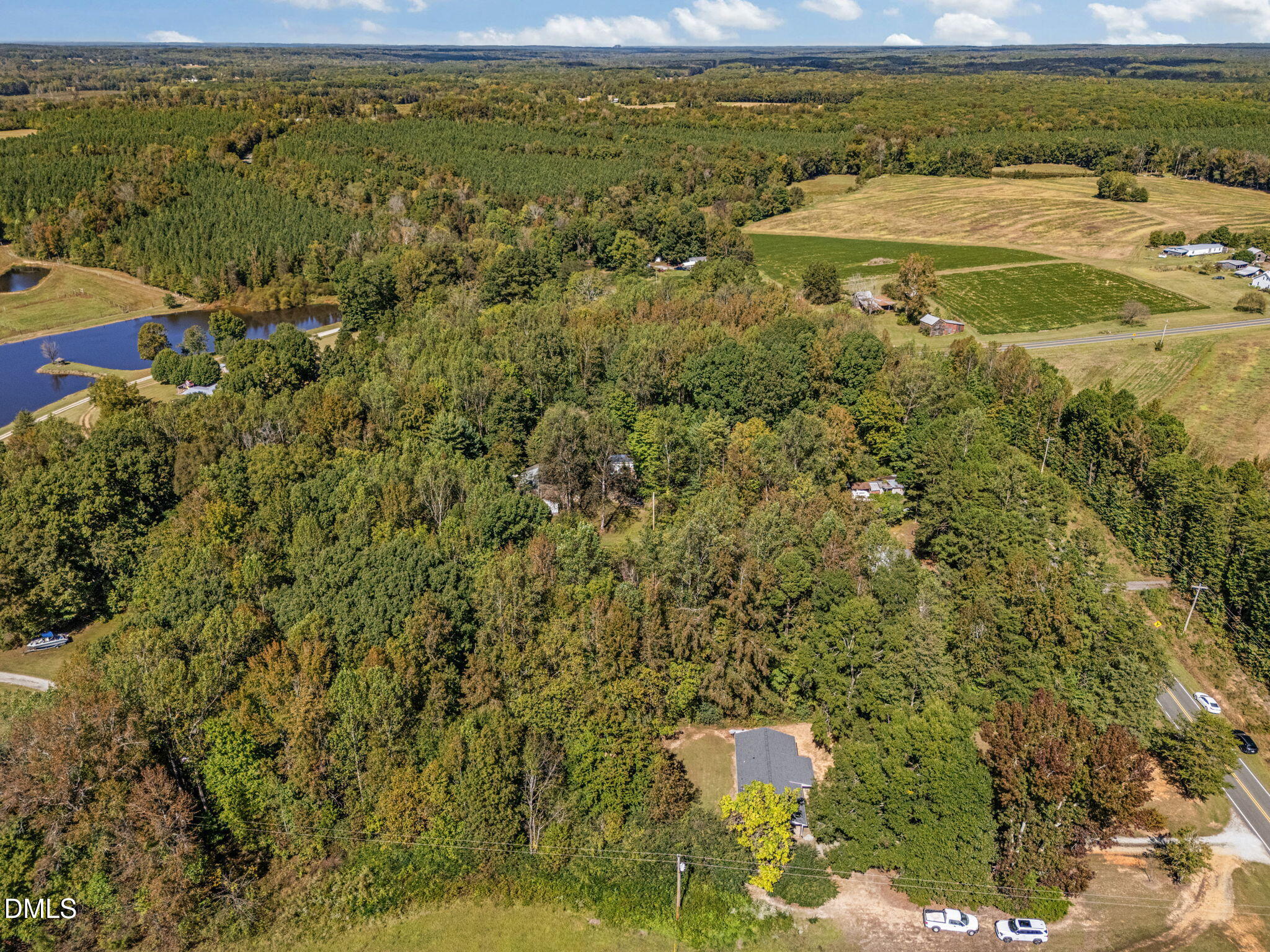 670 Tingen Mine Road Roxboro, NC 27574 - Photo 27 of 30 a view of a yard with an outdoor space