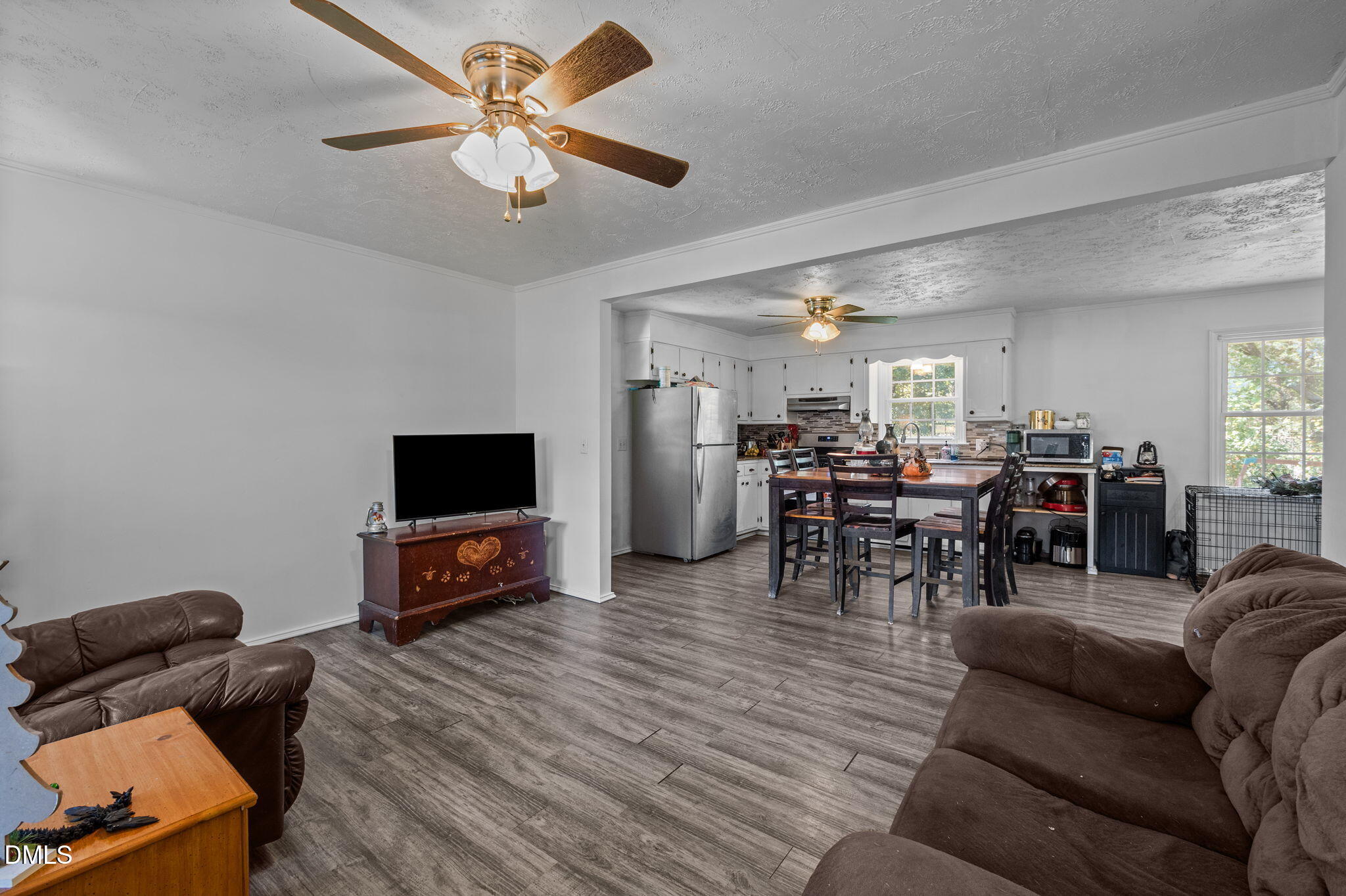 670 Tingen Mine Road Roxboro, NC 27574 - Photo 2 of 30 a living room with furniture and a flat screen tv
