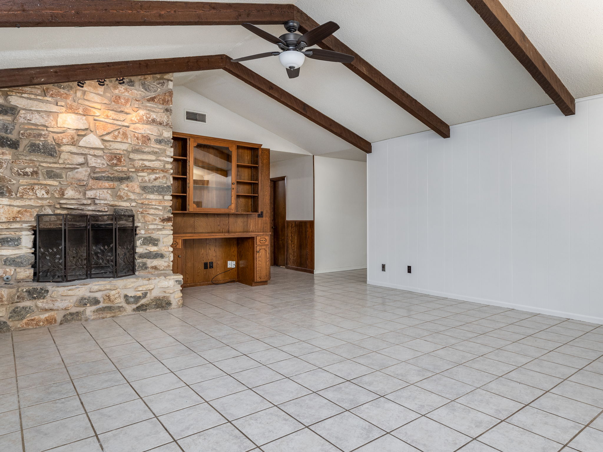 806 Country Club Road Georgetown, TX 78628 - Photo 8 of 39 The living room features a stone fireplace
