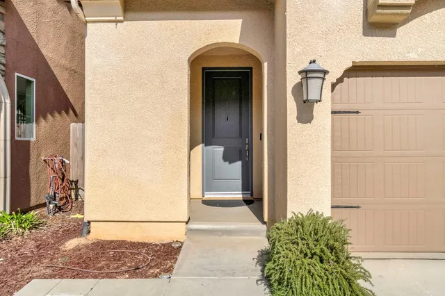 a view of a door and a window