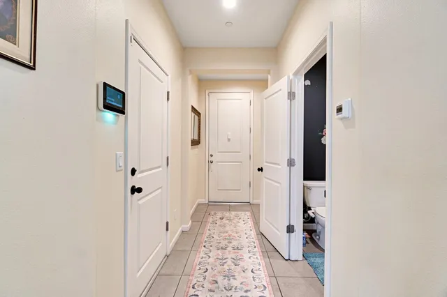 a bathroom with a glass door shower