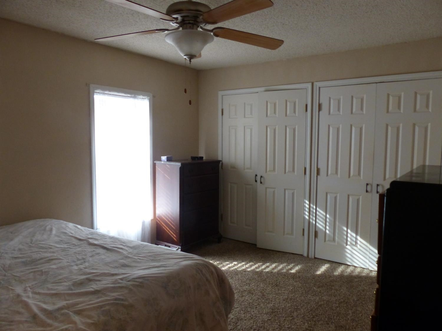 1401 Ave J Abernathy, TX 79311 - Photo 12 of 23 a bedroom with a bed and a window