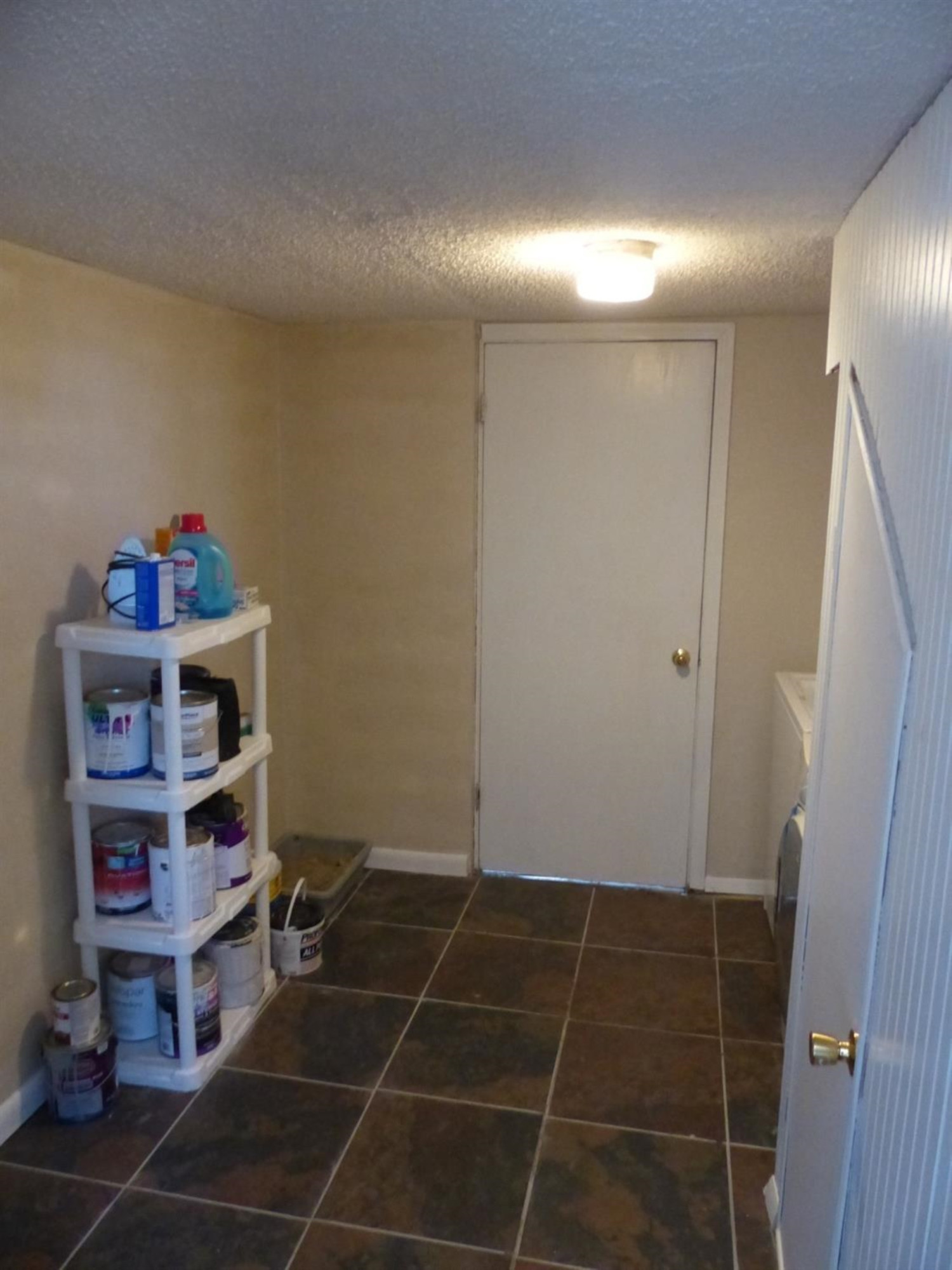 1401 Ave J Abernathy, TX 79311 - Photo 14 of 23 a room with storage and utility