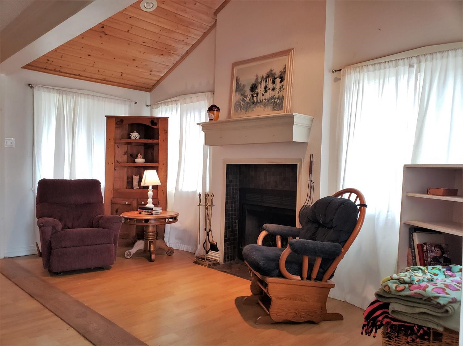 1401 Ave J Abernathy, TX 79311 - Photo 5 of 23 a living room with furniture and a fireplace