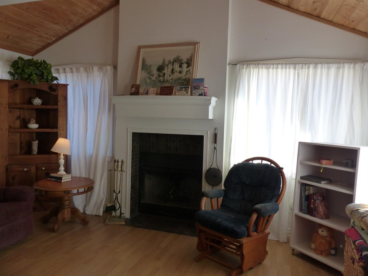 1401 Ave J Abernathy, TX 79311 - Photo 6 of 23 a living room with furniture and a fireplace