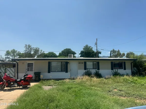front view of a house with a patio