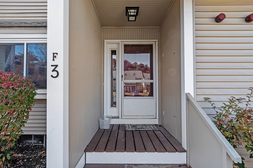 168 Ayer Road, Unit F3 Shirley, MA 01464 - Photo 2 of 36 a view of a house with a door and a window