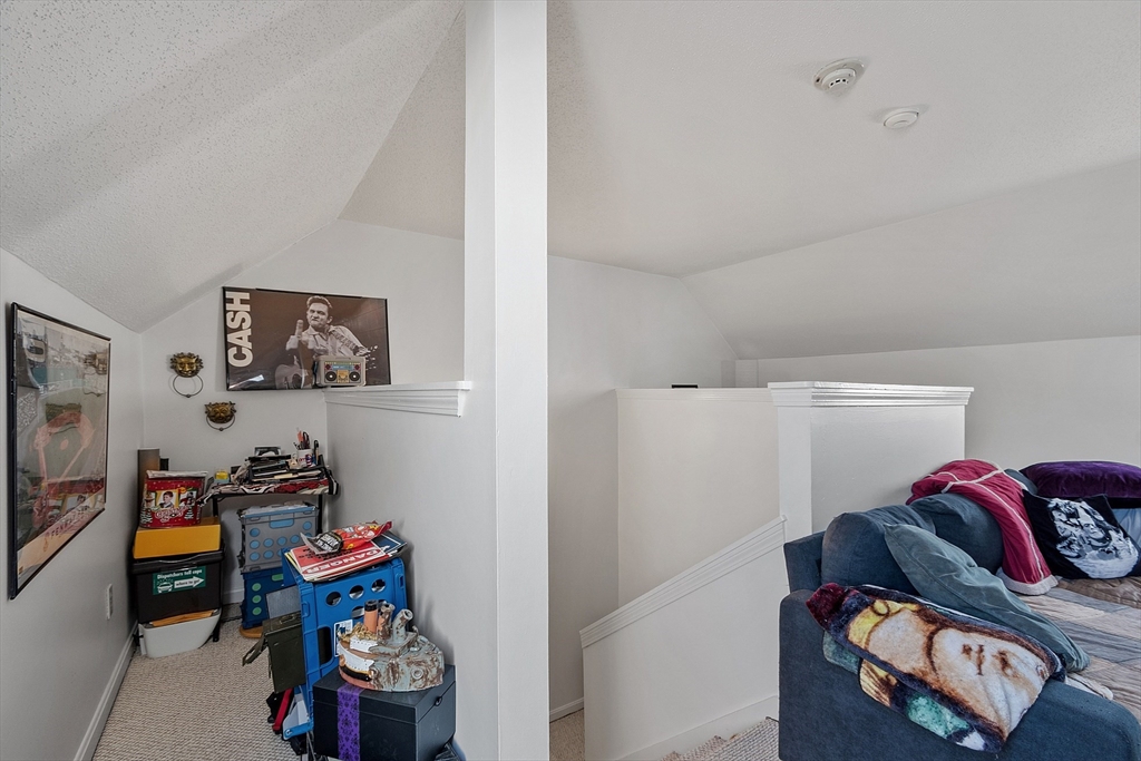 168 Ayer Road, Unit F3 Shirley, MA 01464 - Photo 23 of 36 a bedroom with storage and utility