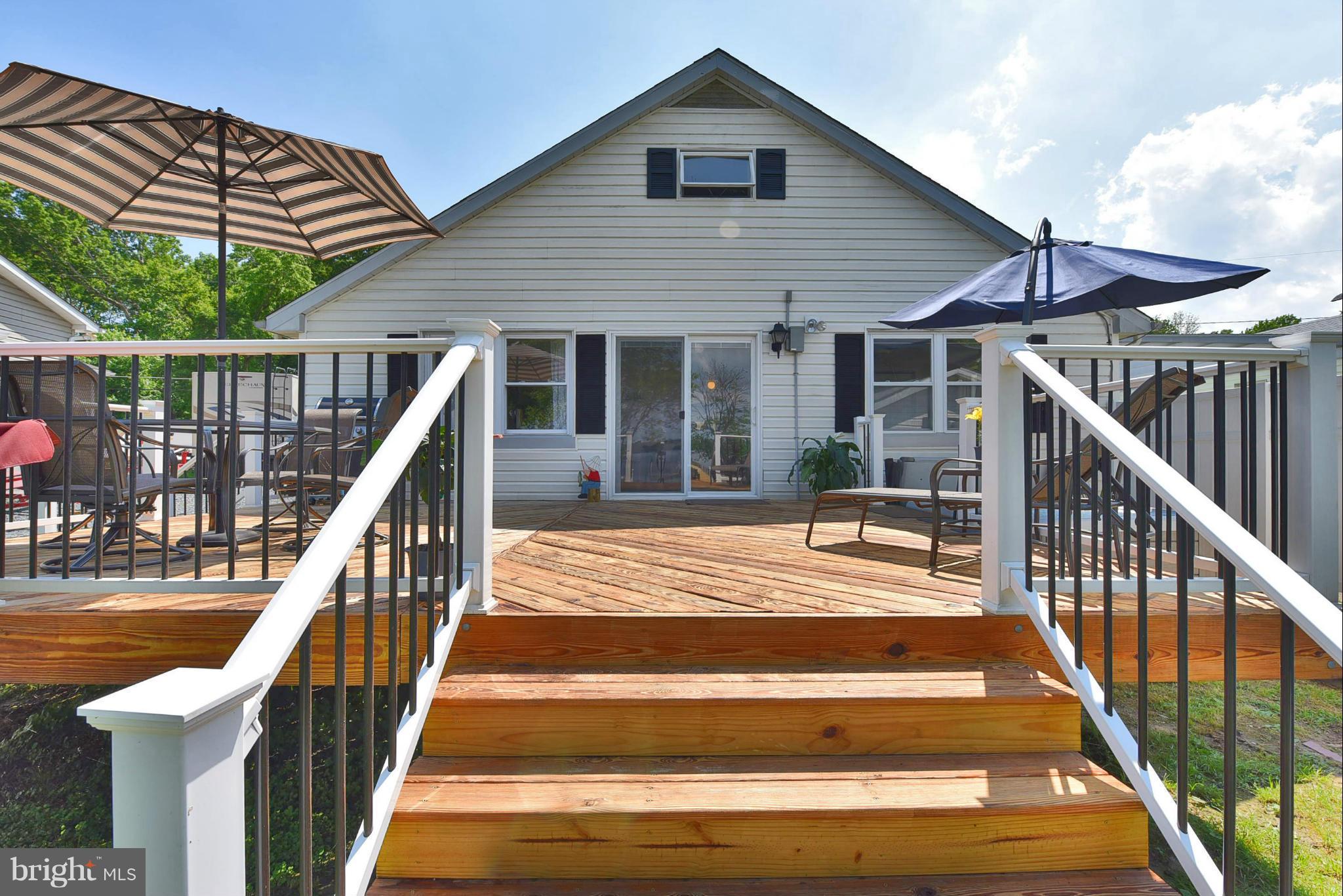 7124 Greenbank Road Baltimore, MD 21220 - Photo 7 of 30 a view of house with staircase and wooden floor