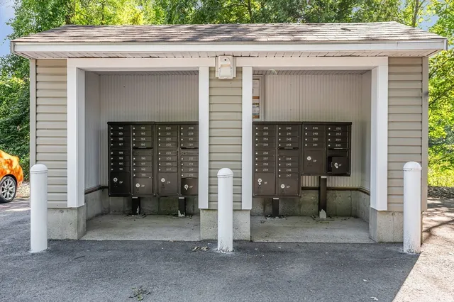 a view of a door of the house and garage