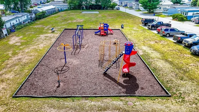 swimming pool view with a garden
