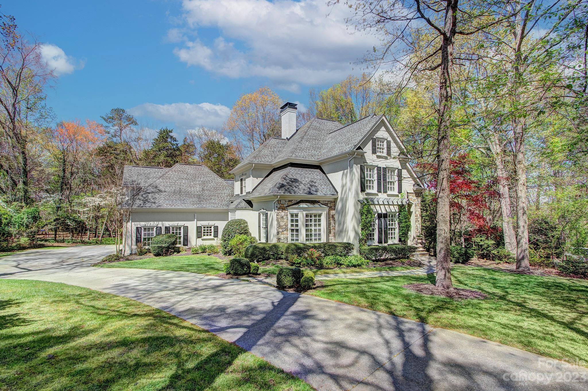 4500 Nora's Path Road Charlotte, NC 28226 - Photo 1 of 48 a front view of a house with garden