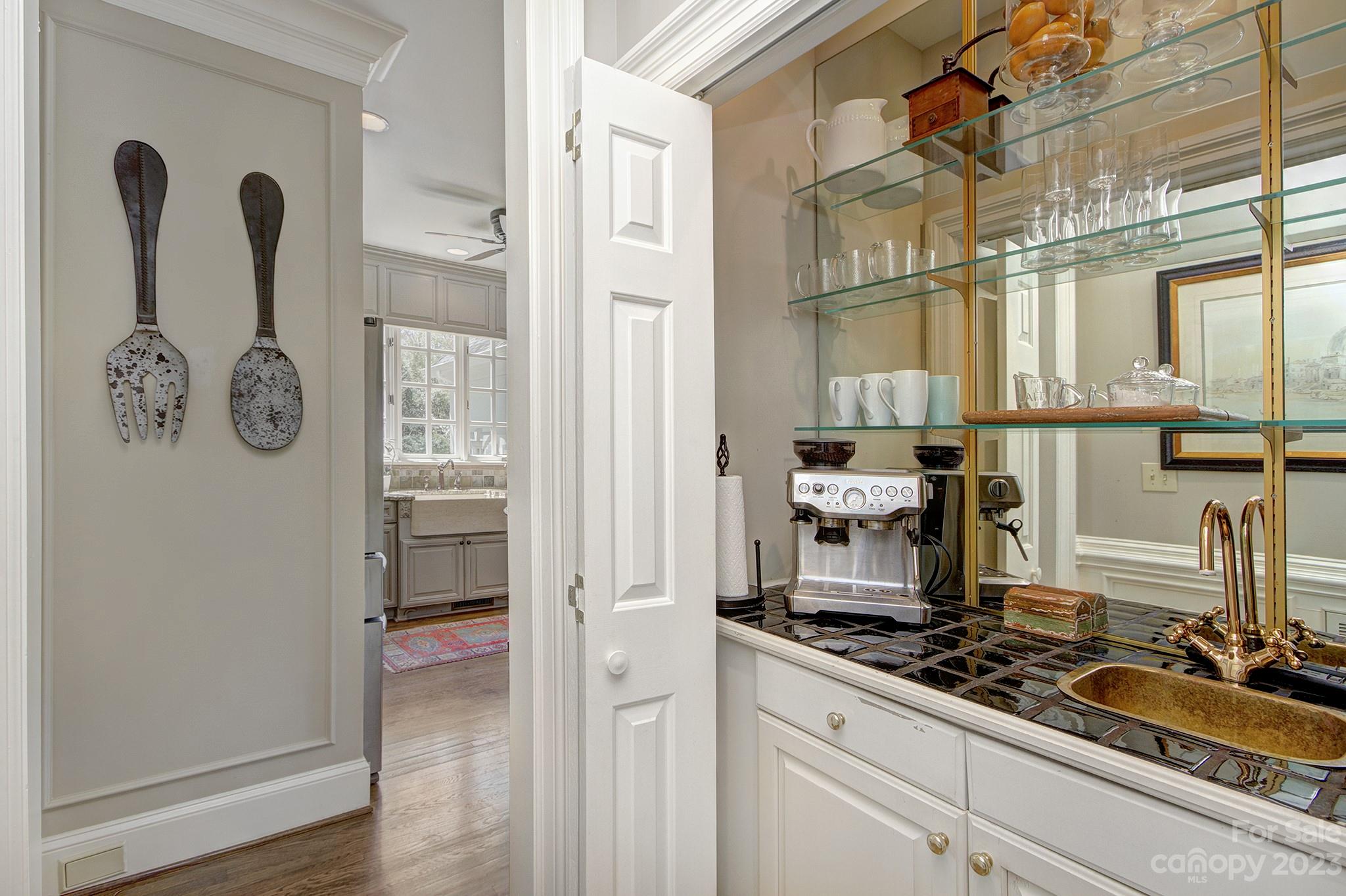4500 Nora's Path Road Charlotte, NC 28226 - Photo 13 of 48 a kitchen with white cabinets and a stove