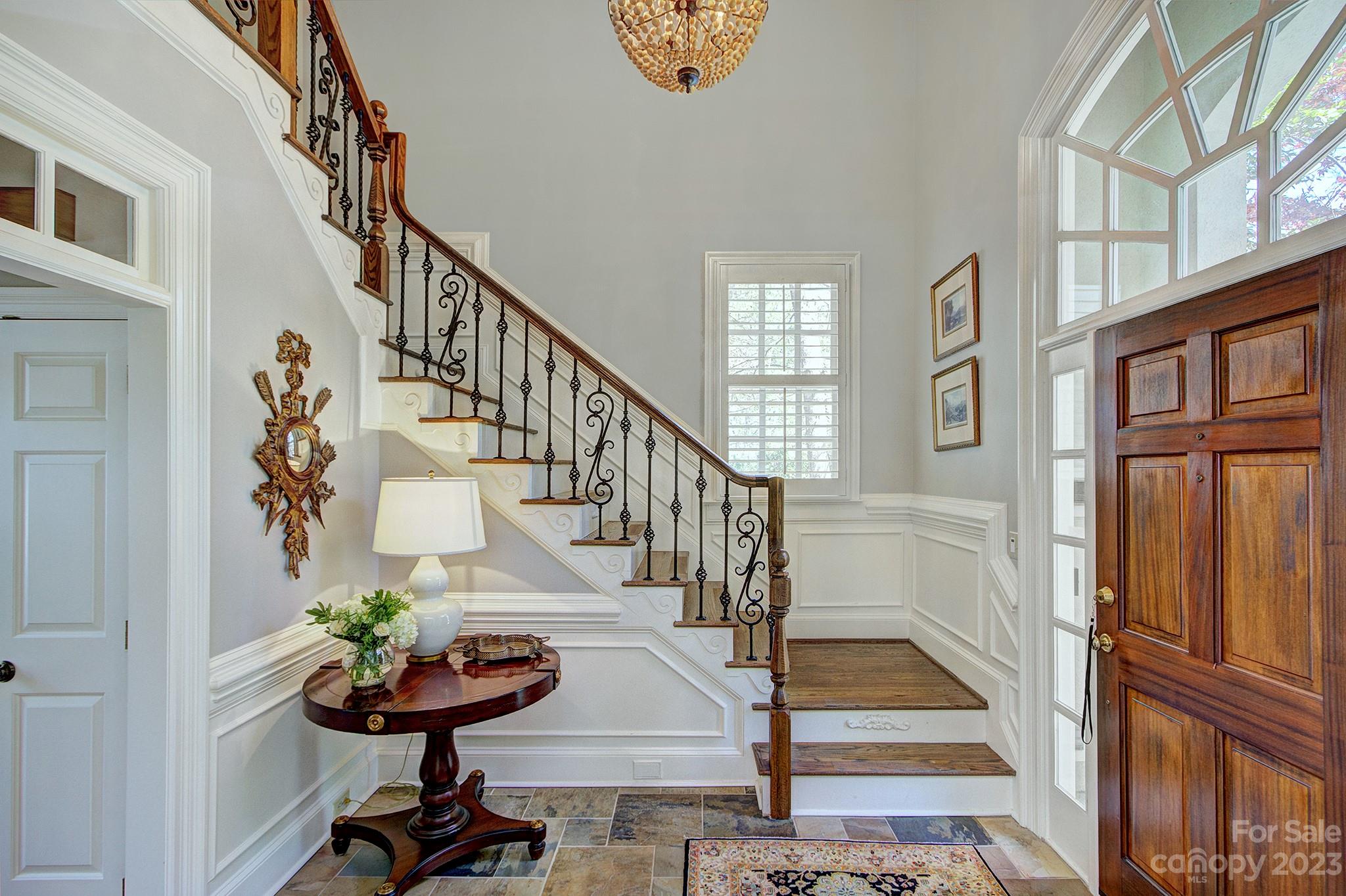 4500 Nora's Path Road Charlotte, NC 28226 - Photo 2 of 48 a view of entryway and hall with wooden floor
