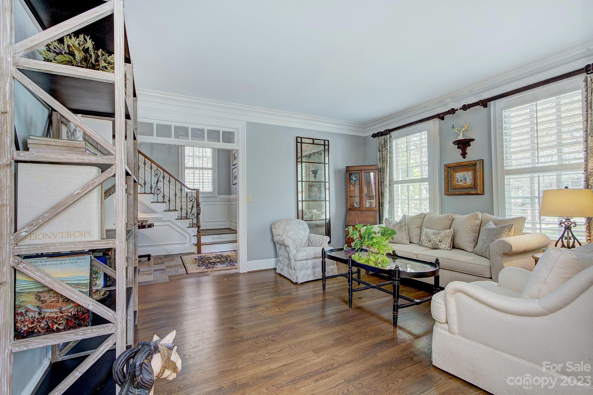 4500 Nora's Path Road Charlotte, NC 28226 - Photo 3 of 48 a living room with furniture and wooden floor