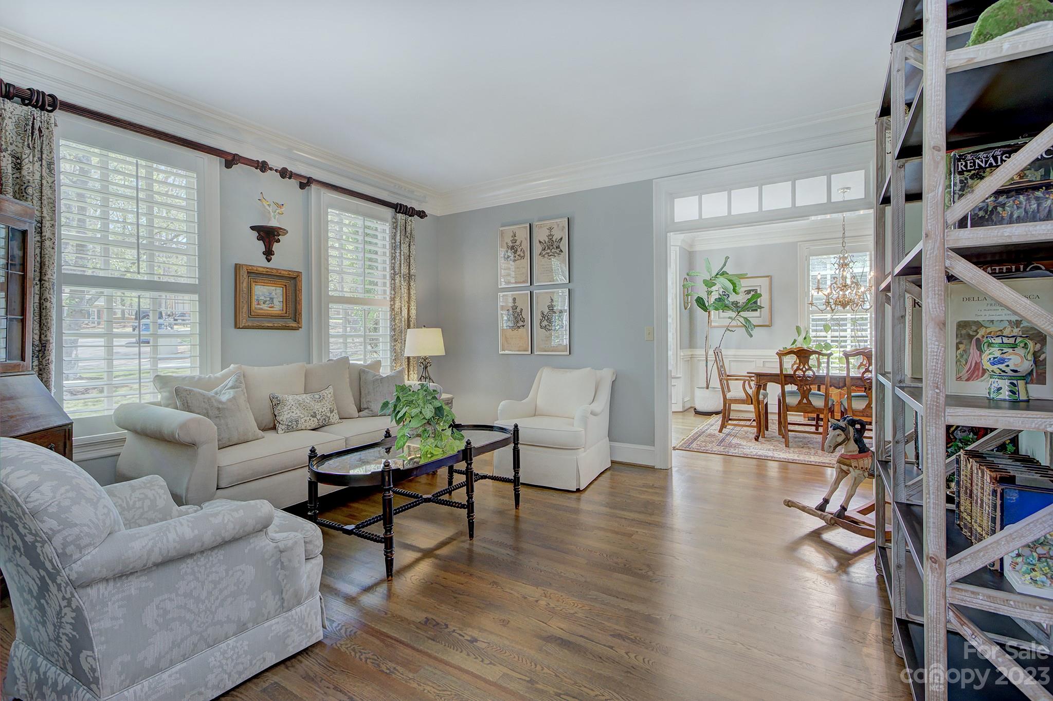 4500 Nora's Path Road Charlotte, NC 28226 - Photo 4 of 48 a living room with furniture a bookshelf and a window