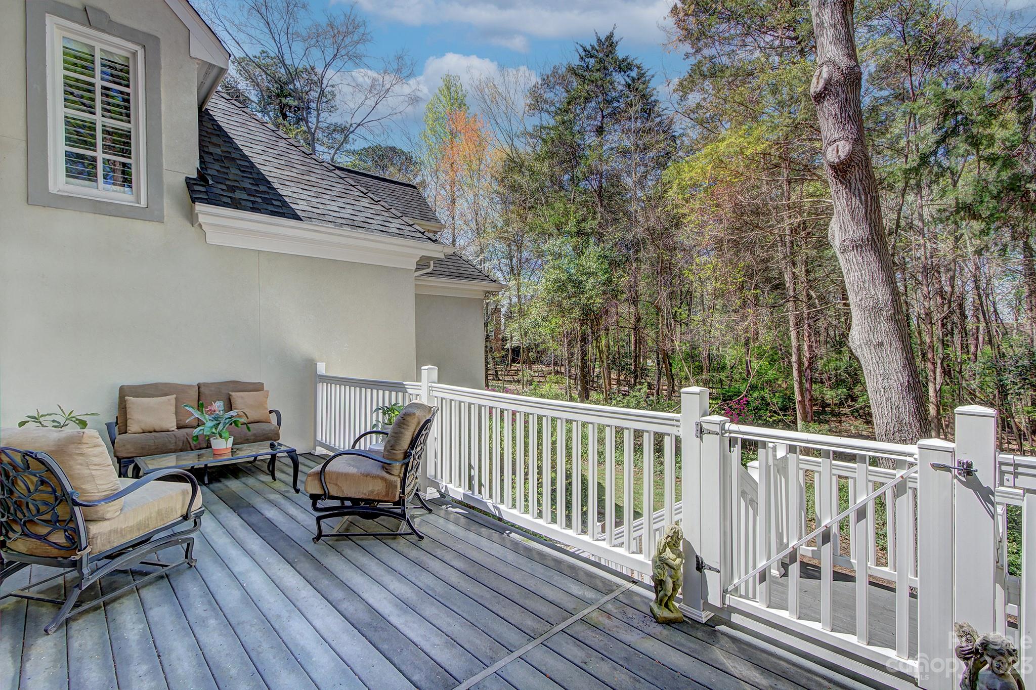4500 Nora's Path Road Charlotte, NC 28226 - Photo 41 of 48 a view of balcony with furniture and wooden deck