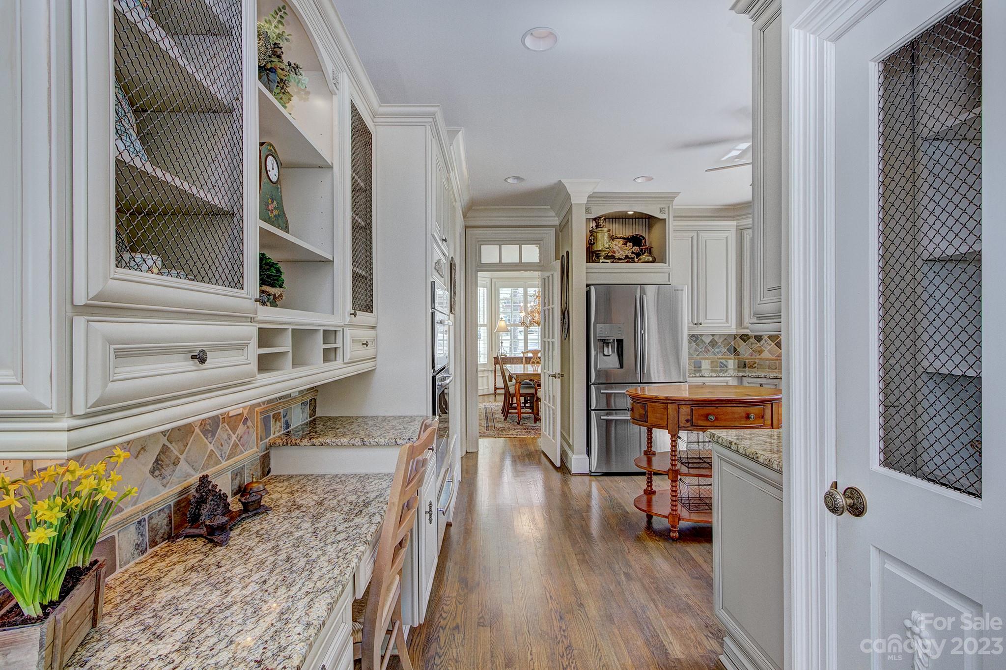 4500 Nora's Path Road Charlotte, NC 28226 - Photo 10 of 48 a view of an entryway with wooden floor and windows