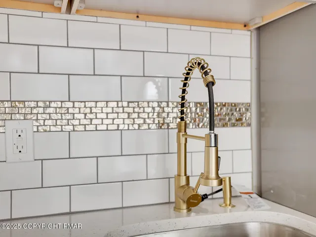 a view of pool with patio