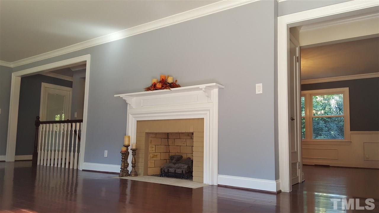 4301 Rowan Street Raleigh, NC 27609 - Photo 4 of 20 a view of livingroom with furniture and wooden floor