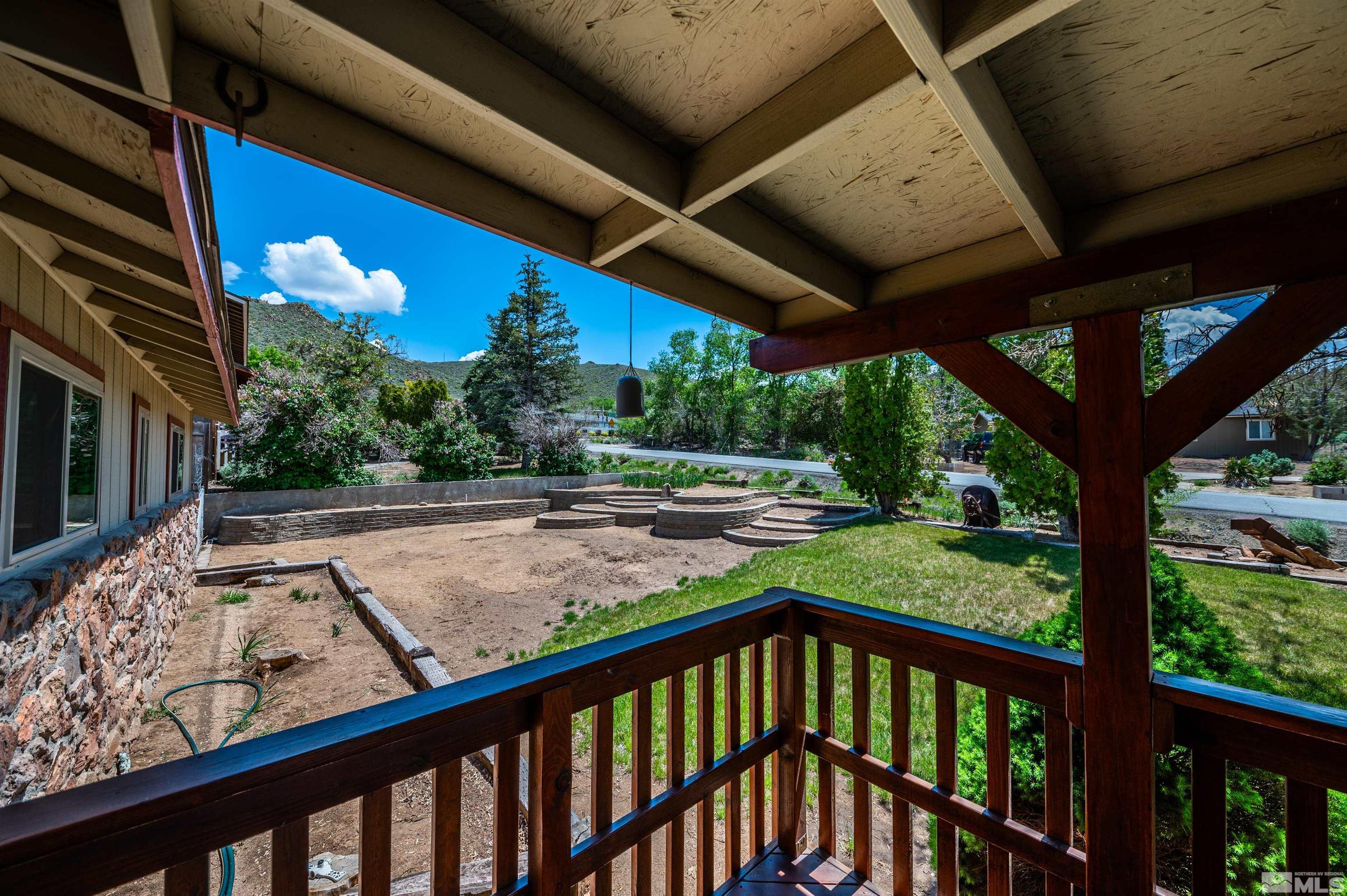 8765 Aquifer Way Reno, NV 89506 - Photo 8 of 39 a view of a porch