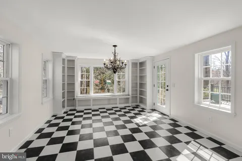 a black and white checkered floor with a black white checkered floor