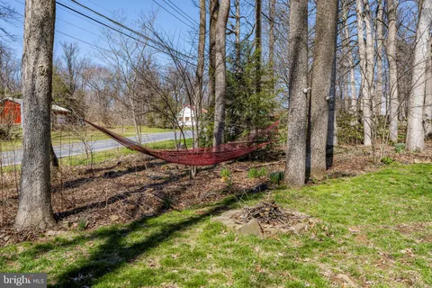 a view of backyard with green space
