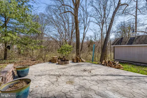 a view of a backyard of the house