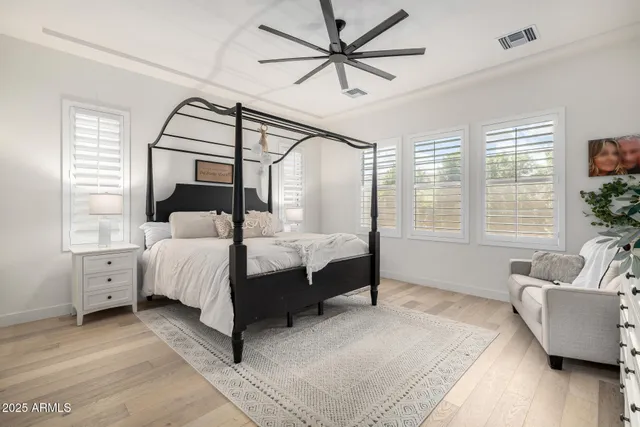 a bathroom with a sink double vanity and a mirror