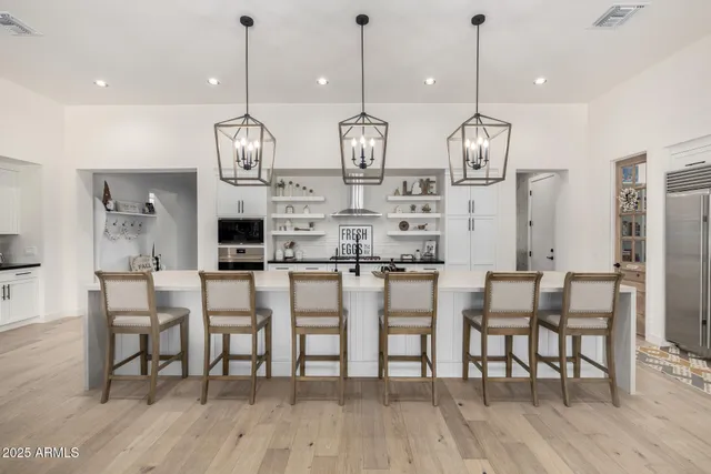 a view of a kitchen and dining room