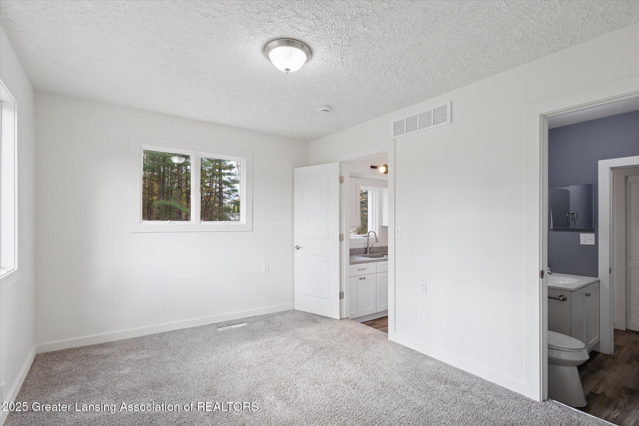 9595 East State Road Haslett, MI 48840 - Photo 18 of 47 17-9595-State-Rd-WindowStill-Photography