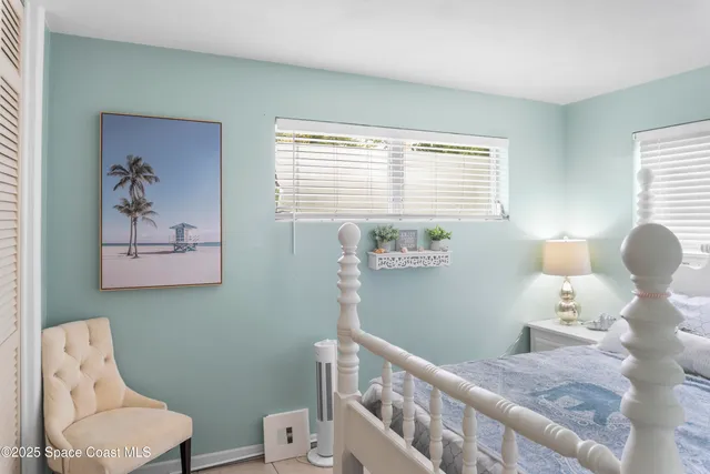 a bedroom with a bed and furniture