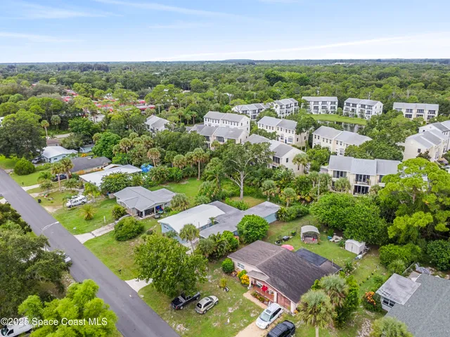 an aerial view of multiple house