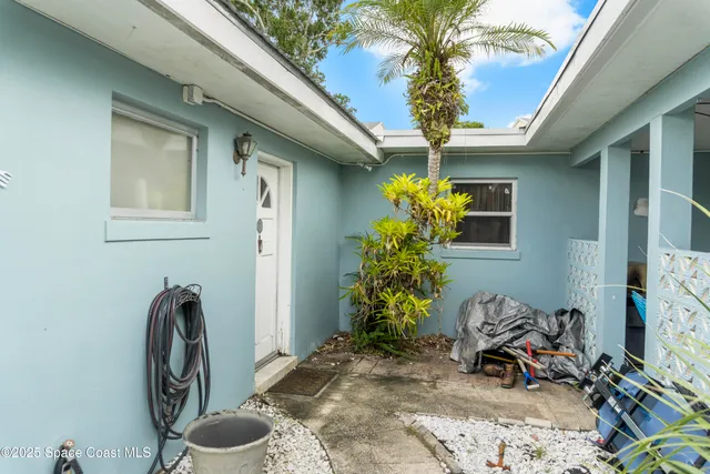 a front view of a house with patio