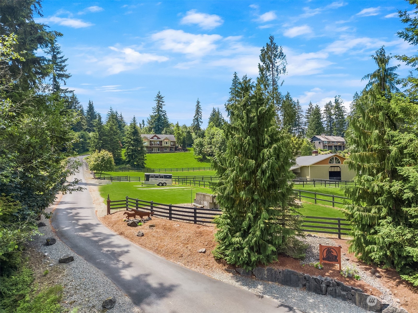 28831 Southeast 262nd Street Ravensdale, WA 98051 - Photo 2 of 40 a view of a park with plants and a bench