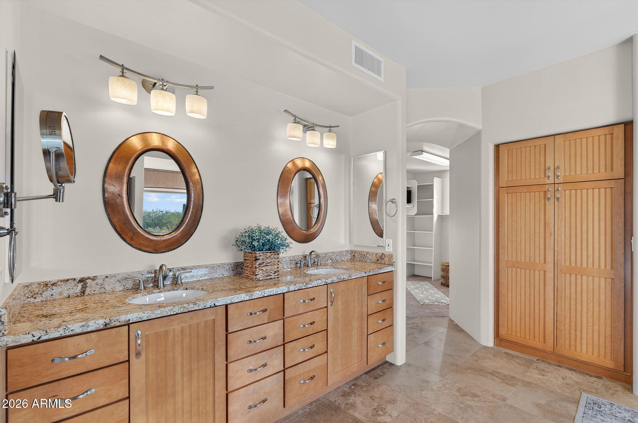 8540 East McDowell Road, Unit 110 Mesa, AZ 85207 - Photo 24 of 74 a bathroom with a granite countertop double vanity sink and a mirror