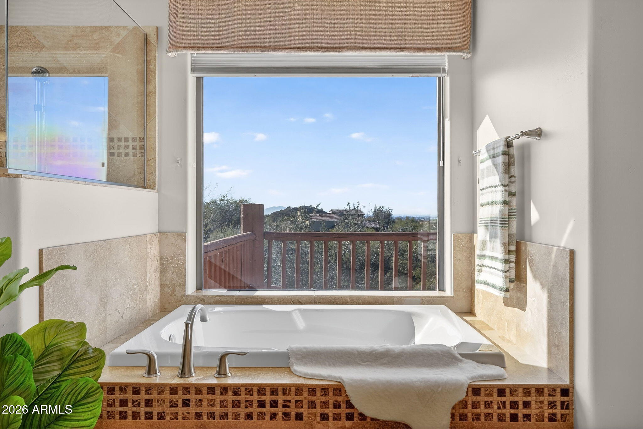 8540 East McDowell Road, Unit 110 Mesa, AZ 85207 - Photo 26 of 74 a bathroom with a bathtub and a shower