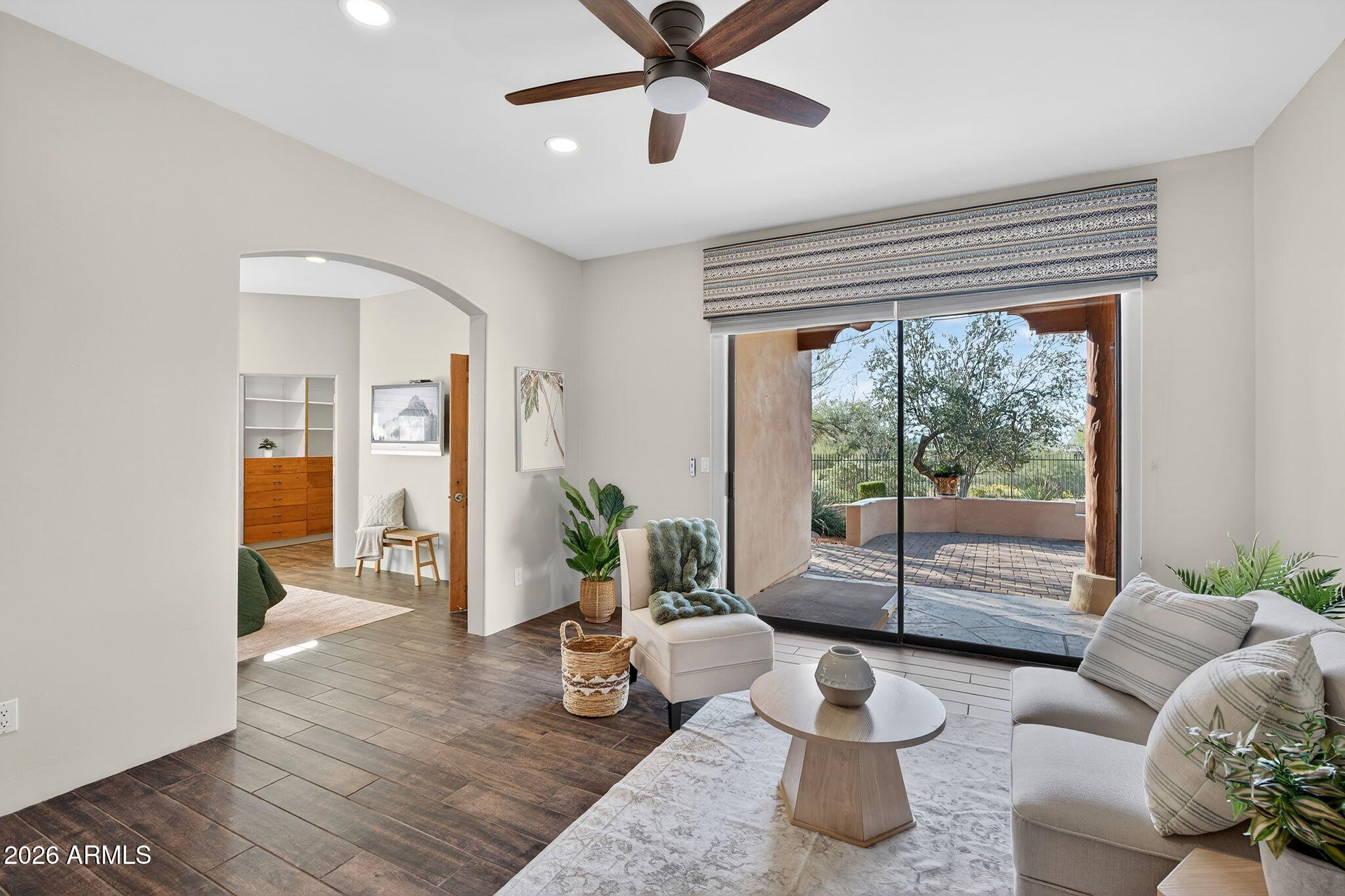 8540 East McDowell Road, Unit 110 Mesa, AZ 85207 - Photo 28 of 74 a living room with furniture and a potted plant