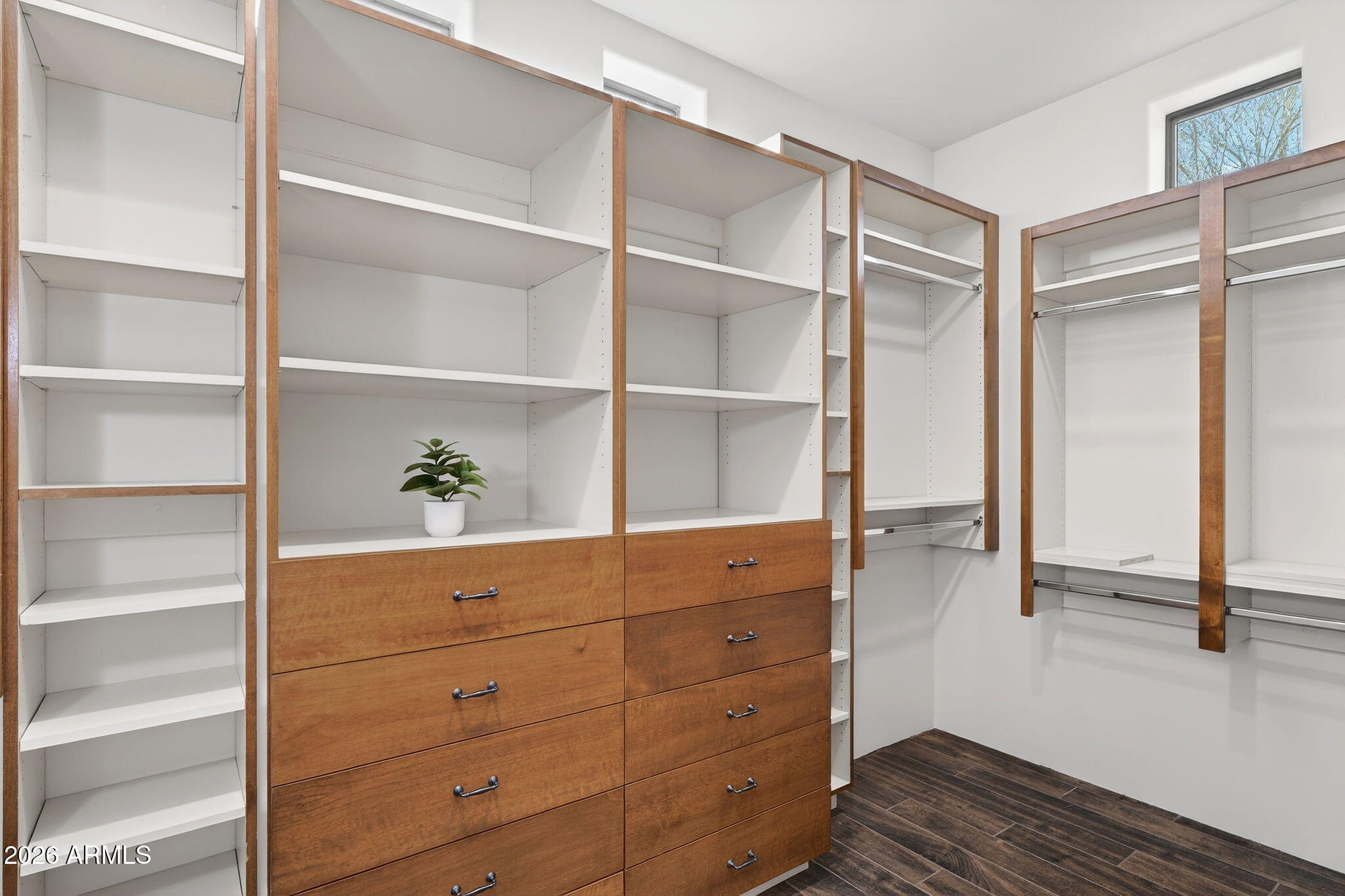 8540 East McDowell Road, Unit 110 Mesa, AZ 85207 - Photo 31 of 74 a view of an empty walk in closet