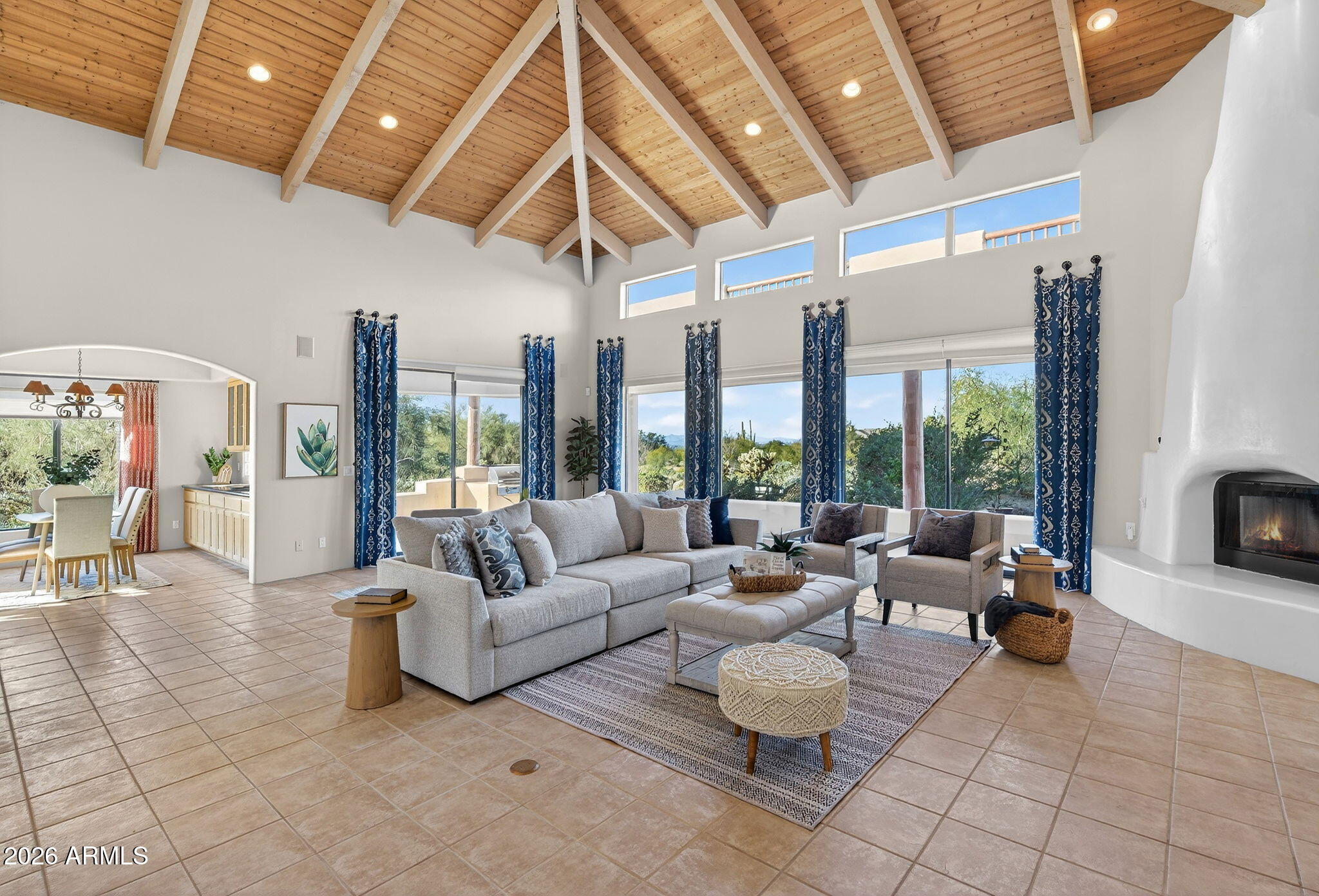 8540 East McDowell Road, Unit 110 Mesa, AZ 85207 - Photo 3 of 74 a living room with furniture and large windows