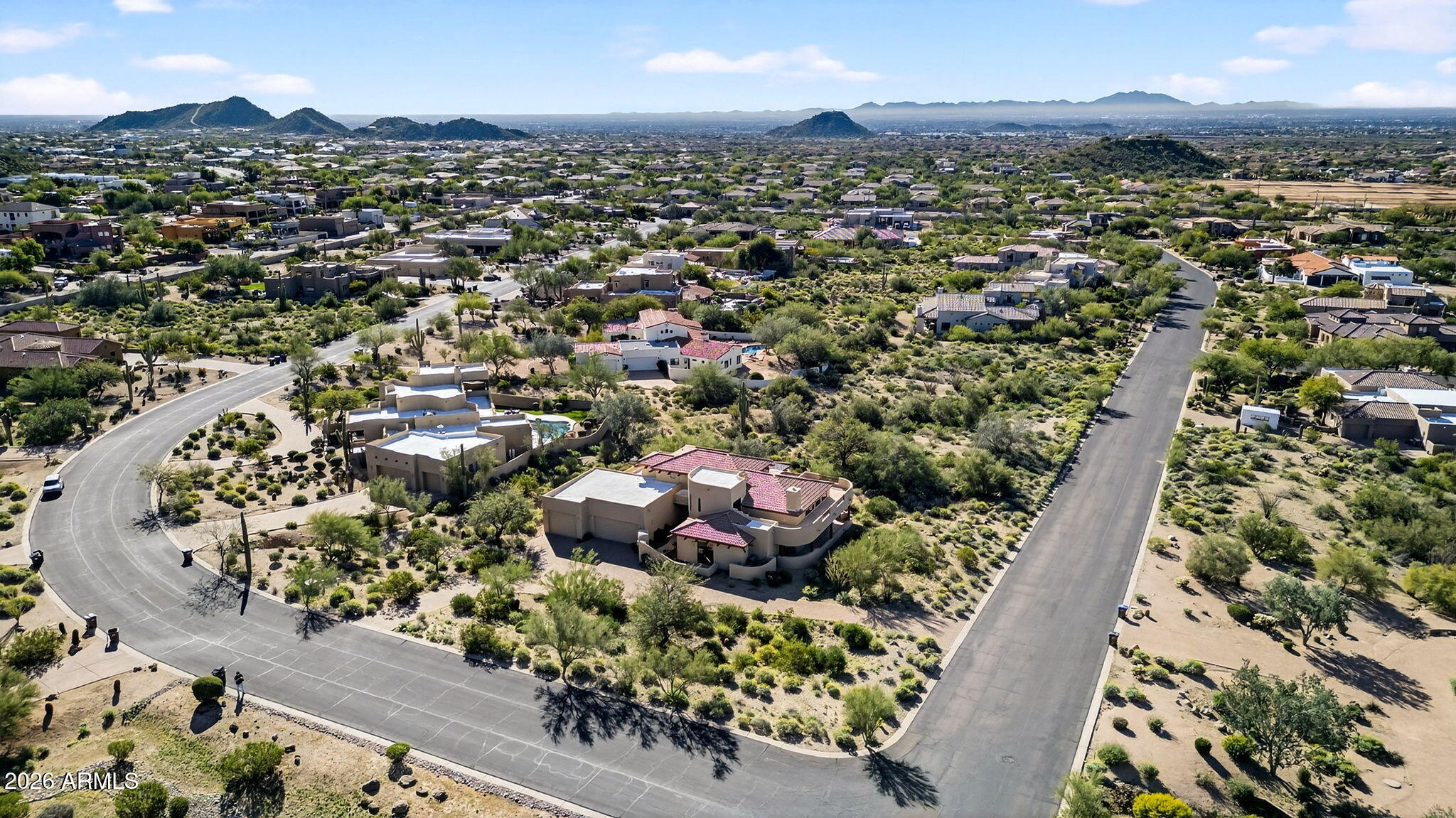 8540 East McDowell Road, Unit 110 Mesa, AZ 85207 - Photo 54 of 74 an aerial view of a city with lots of residential buildings
